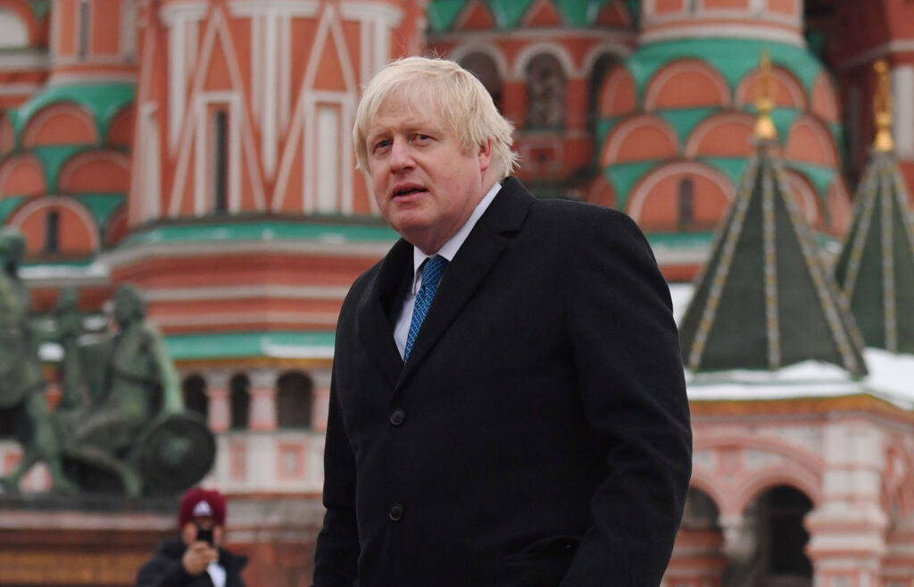 Boris Johnson stands in front of St Basil's Cathedral, Moscow